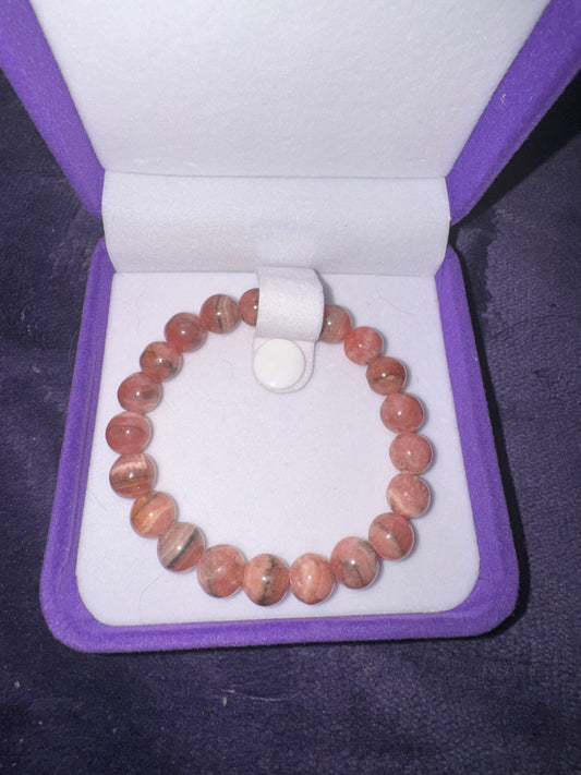 HQ 9mm Rhodochrosite Bead Bracelet. Already priced for the Clearance Sale. Enjoy the discount for this beauty.