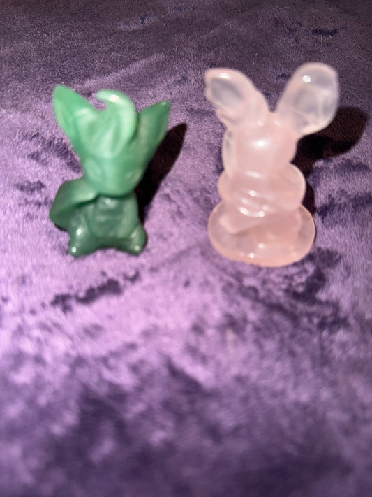 Leafeon and Sylveon ( evolutions of Eevee Pokemon )